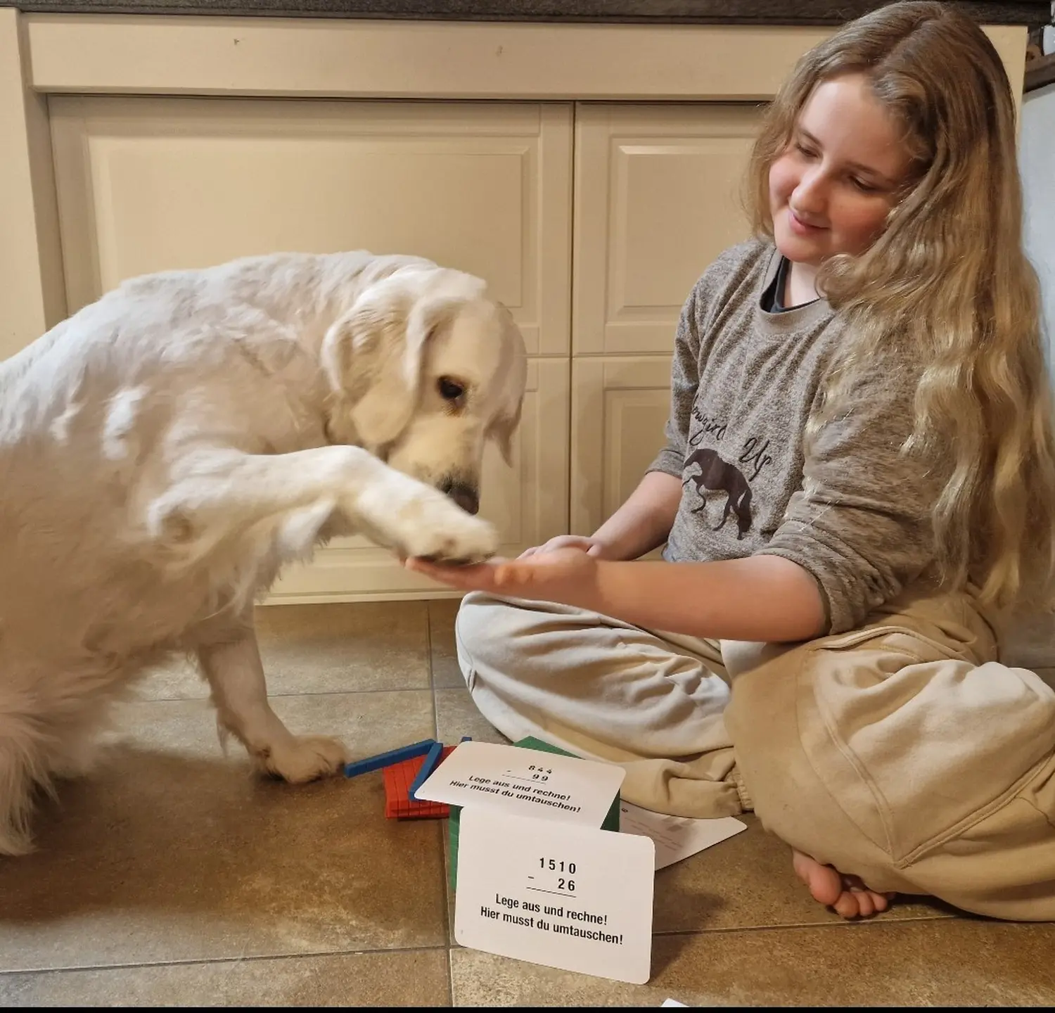 Mädchen und Hund von Praxis für Logopädie Marina Unger